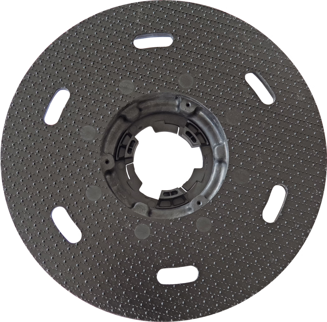 PALLMANN_dummy_PALLMANN SPIDER pad disc with coupling_msl_2017-02 Circular black plastic backing plate with a textured dotted surface and a central locking hub; several elongated oval slots are evenly spaced near the outer area; a central round opening contains molded retention features for attaching to a tool; intended as a mounting pad for sanding or polishing discs; the surface has uniformly raised dots to improve grip; slight signs of use are visible; photographed on a white background.